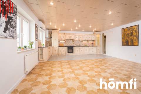 Penthouse z fotowoltaika i szklanym sufitem