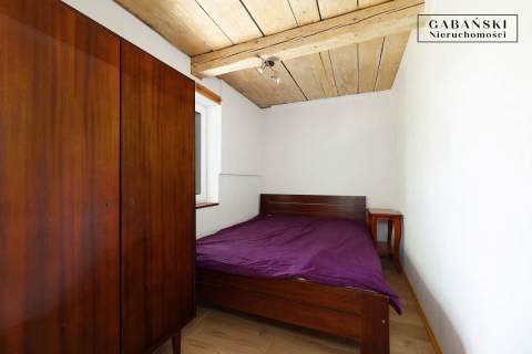 DREWNIANY DOM PO GRUNTOWNYM REMONCIE NA 1,35 HA -