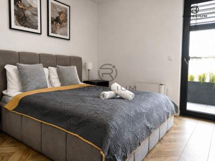 NOWOCZESNY APARTAMENT MIEJSCE POSTOJOWE INWESTYCJA