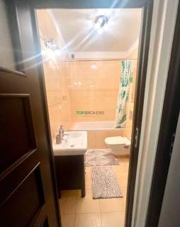 Salon z aneksem i sypialnia, balkon, garaż