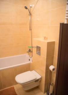 Salon z aneksem i sypialnia, balkon, garaż