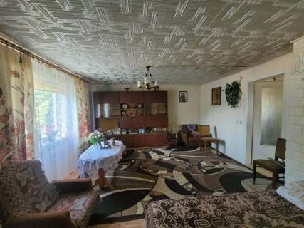 Drewniany dom z dodatkową działką