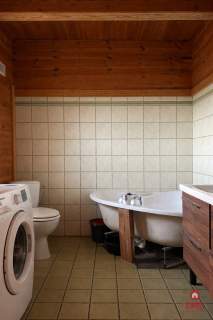 Drewniany dom premium nad stawem 1 ha Sauna