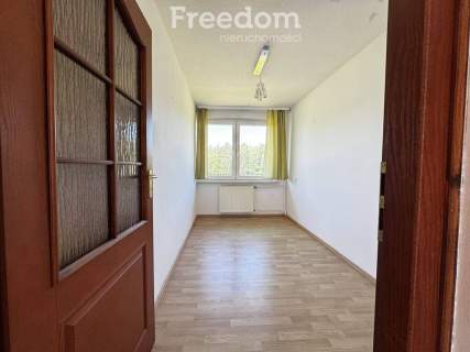 Dwupoziomowe mieszkanie z garażem i ogrodem
