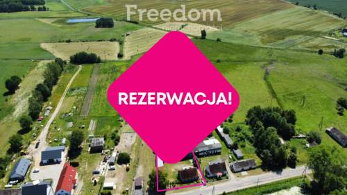 Dom z dużą działką i budynkami gospodarczymi
