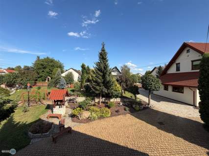 Całoroczny dom z bajkowym ogrodem i fotowoltaiką