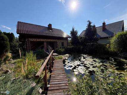 Całoroczny dom z bajkowym ogrodem i fotowoltaiką