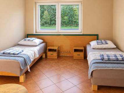 OBIEKT BIUROWO-HOTELOWY Z MIESZKANIEM 6 GARAŻY