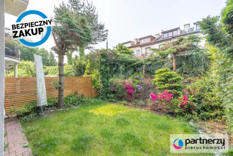 Stylowy Apartament z Ogrodem, Balkonem i Garażem
