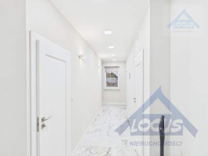 Sprzedam dwupoziomowy apartament z ogrodem - Wawer