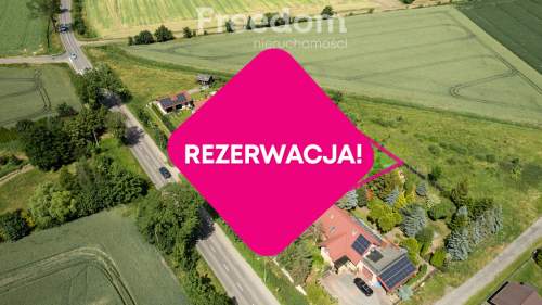 Działka z projektem domu i budynku z wiatą 