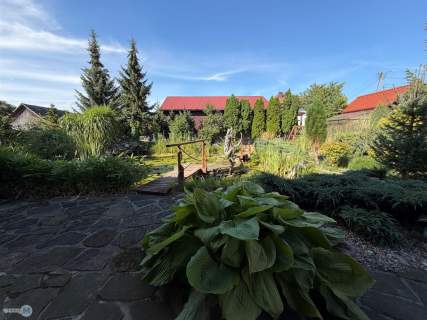 Całoroczny dom z bajkowym ogrodem i fotowoltaiką