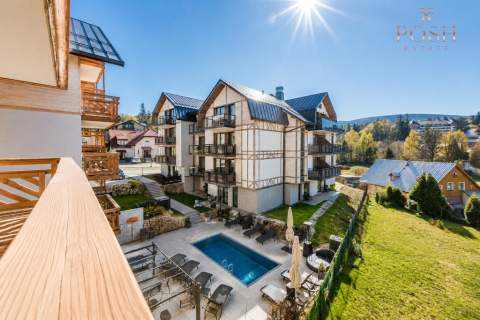 widok na basen inwestycja balkon własna sauna