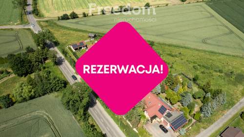 Działka z projektem domu i budynku z wiatą 