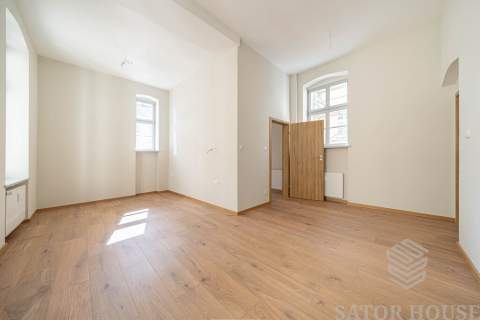 Apartament w odrestaurowanej kamienicy obok Rynku