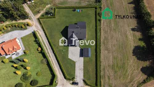 Nowoczesny dom z dużą działką w spokojnej okolicy