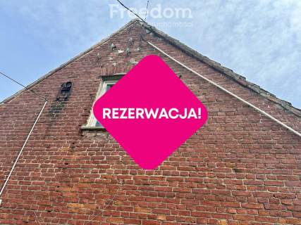 Dom z dużą działką i budynkami gospodarczymi