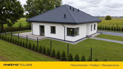 Dom parterowy wolnostojący - z kominkiem