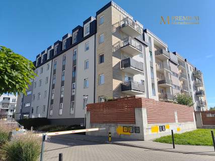 Salon z aneksem kuchennym balkon 2 miejsca postojowe