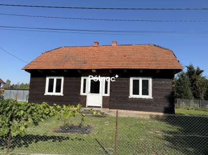 DOM Z PEŁNYCH BALI DREWNIANYCH BUCZKÓW, GM. RZEZAWA 9,30 AR