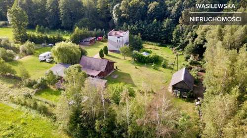 Siedlisko 4776 m2 obok zalewu i lasu 2 domy i budynki gospodarcze