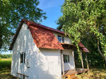 Właściciel sprzeda domek na 16 arach ogrodzonej działki