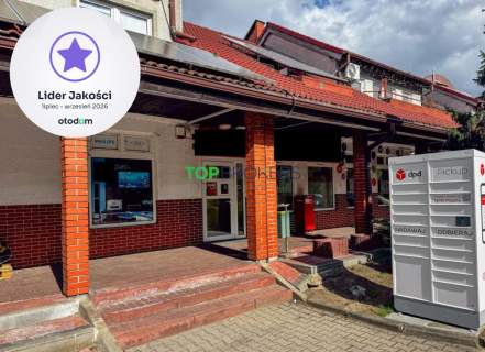 Lokal z witryną w ciągu handlowym z parkingiem