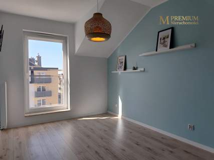 Salon z aneksem kuchennym balkon 2 miejsca postojowe