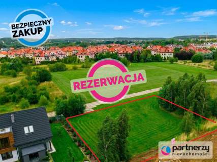 Płaska, słoneczny ogród, w pobliżu las i jezioro