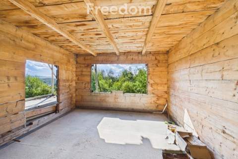 Drewniany dom z widokiem na Tatry