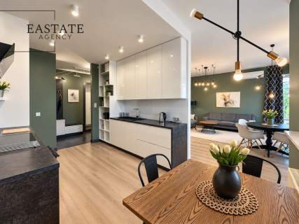 Elegancki apartament z loggią i 2 miejscami postojowymi w Wilanowie