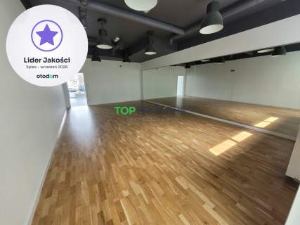 Przestronna sala z lustrem, witryna, dwa wejścia