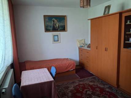Sprzedam 1/8 domu i działki