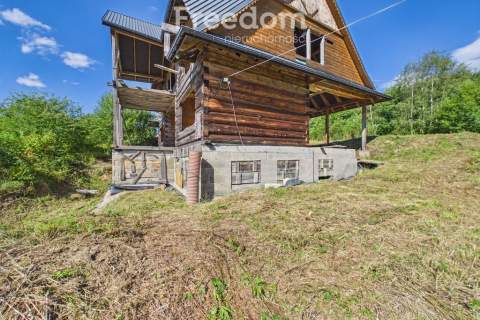 Drewniany dom z widokiem na Tatry