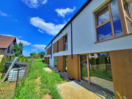 Dom z ogrodem 80,57 m 2 miejsca w cenie
