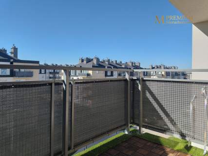 Salon z aneksem kuchennym balkon 2 miejsca postojowe