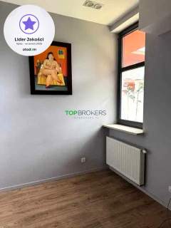 Elegancki lokal z witrynami, obok SOHO