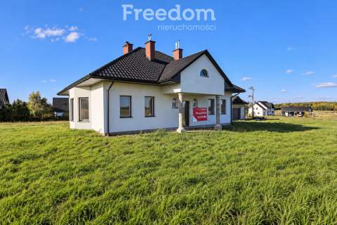 Nowoczesny parterowy dom z garażem 26 ar działka