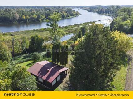 Działka 2032 m z domem z bali Widok na Narew