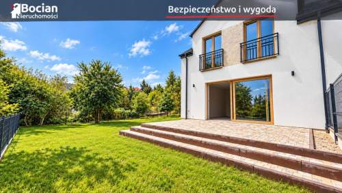 Funkcjonalny, słoneczny bliźniak z dużym ogrodem