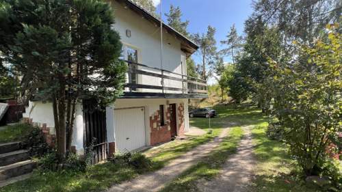 Dom z apartamentem przy jeziorze i lesie