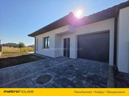  NOWY DOM RAKOWISKA 104,8 m DZIAŁKA 322 m 