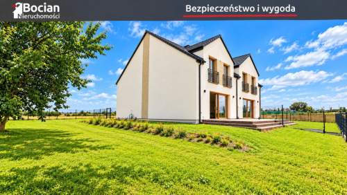 Funkcjonalny, słoneczny bliźniak z dużym ogrodem
