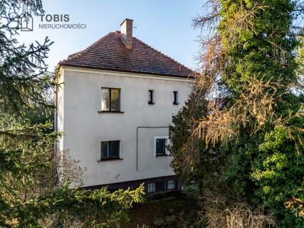 Dom pod działalność usługową lub mieszkalną