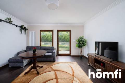 3 pokoje z tarasem w nowoczesnym apartamentowcu