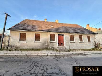 NIERUCHOMOŚĆ Z ZABUDOWANIAMI I DZIAŁKĄ 1 815 m