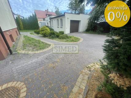 .Centrum Łomianek .Duża działka,dom,garaż z budynkiem gospodarczym