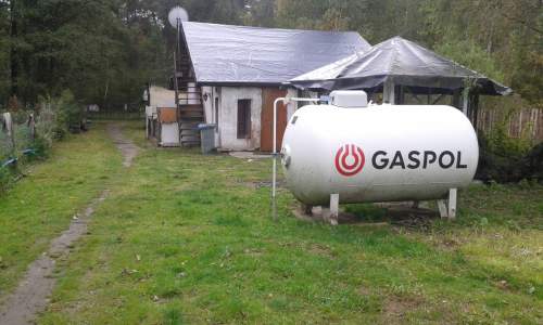 Sprzedam działkę z dwoma domami