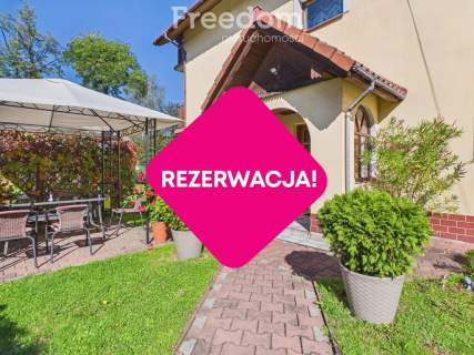 Dom z kominkiem, ogrodem i 2 garażami
