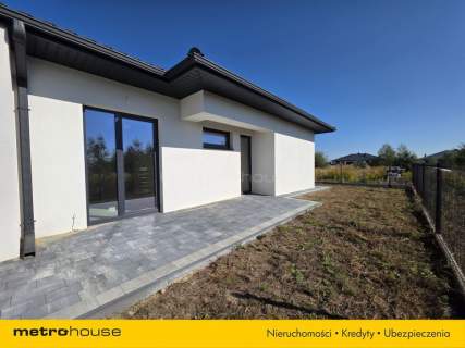  NOWY DOM RAKOWISKA 104,8 m DZIAŁKA 322 m 